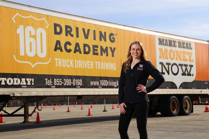 woman-in-front-of-truck