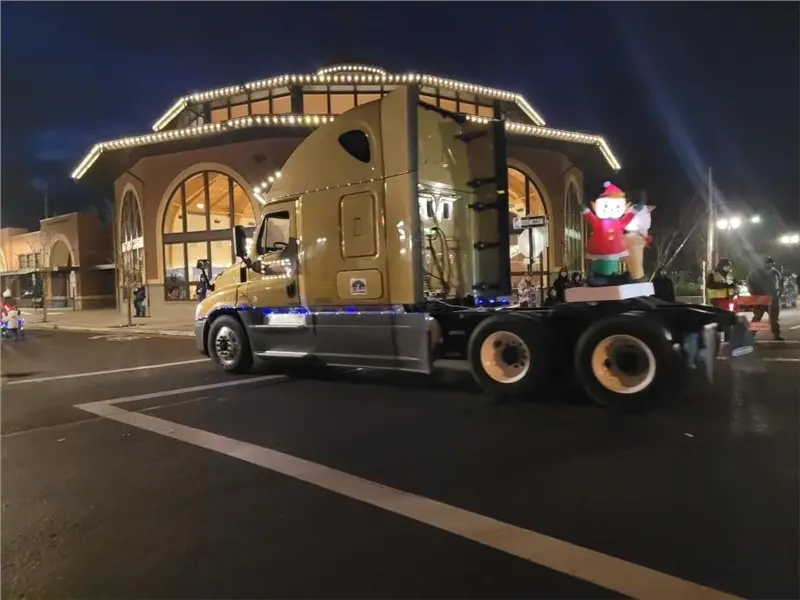 Truck with festive decorations in holiday parade