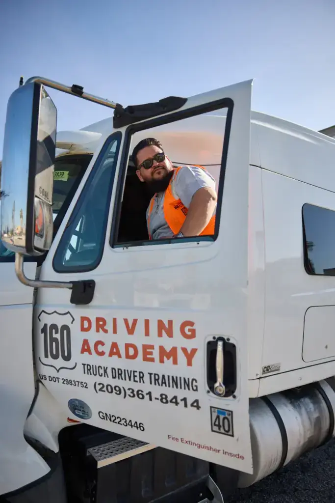 cdl student in 160 truck cab