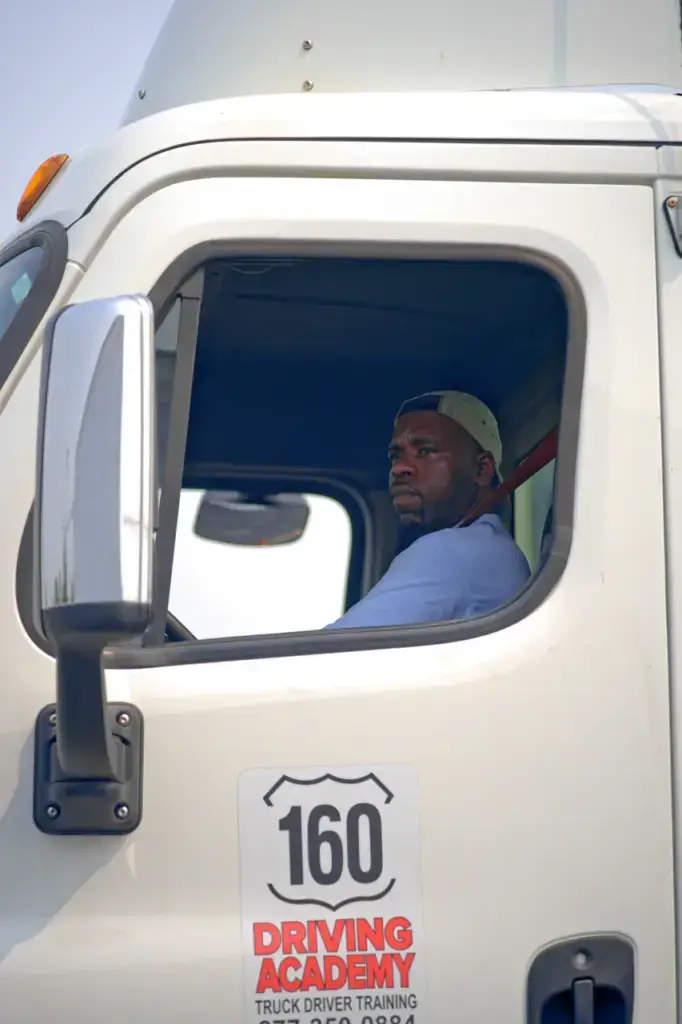 cdl student in truck cab