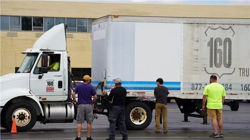 delivery truck and workers