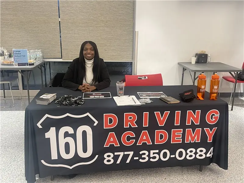 driving academy booth representative