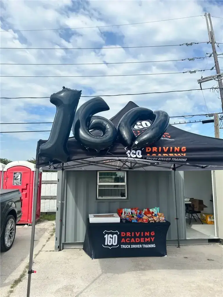 160 Driving Academy event setup with canopy
