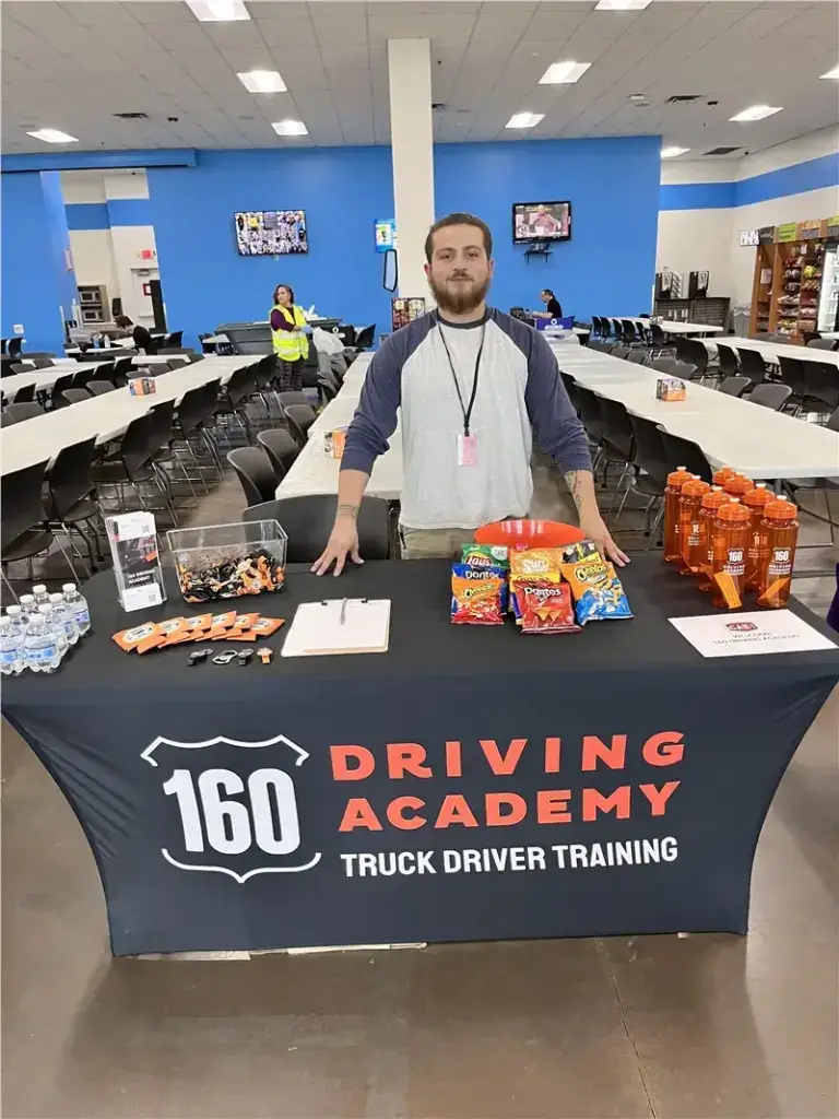 Driving academy event table with promotional items