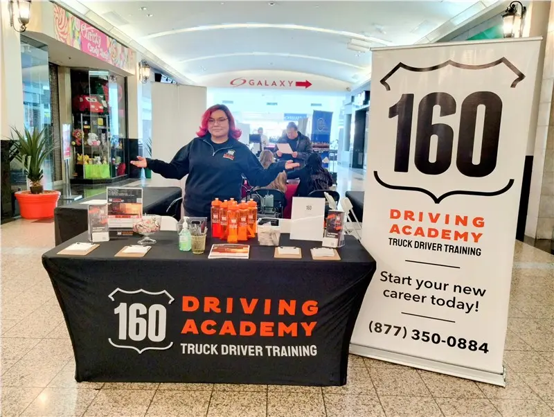 Driving Academy booth at promotional event in mall