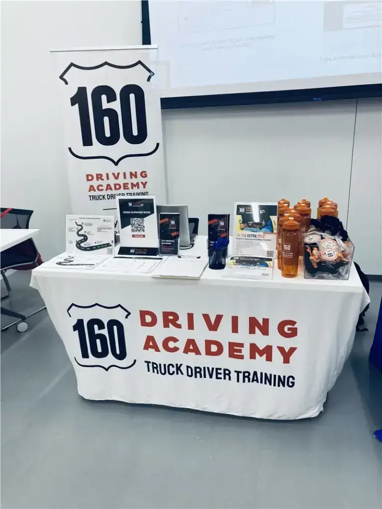 160 Driving Academy promotional display table setup