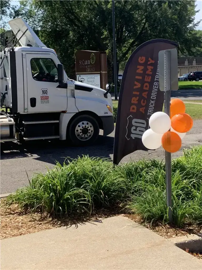 Driving Academy Truck and Banner