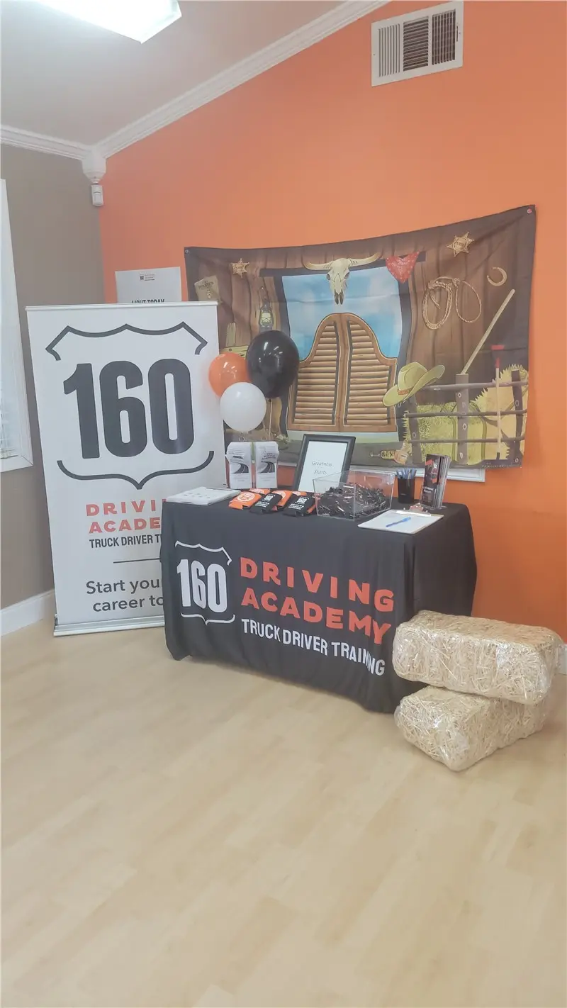 160 Driving Academy event booth with decor