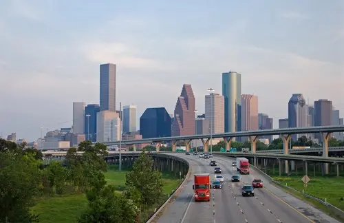 Houston skyline with highway and moving traffic