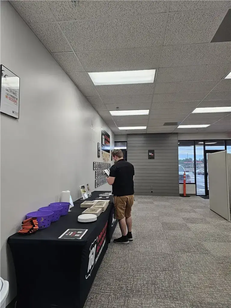 man examining display table