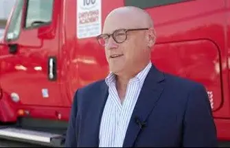 man in front of truck