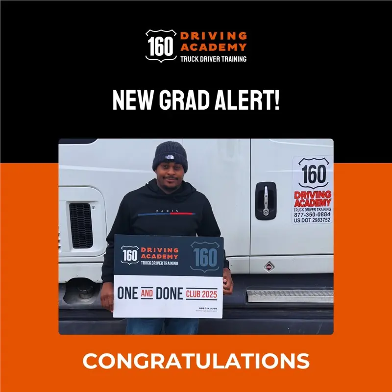 New truck driver graduate holding certificate, smiling proudly