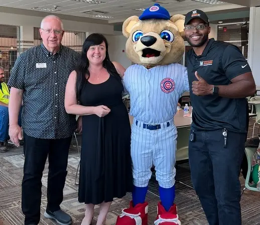 people with sports mascot