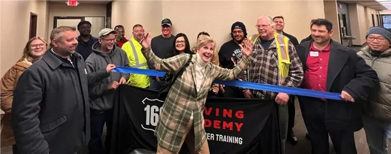 ribbon cutting driving academy event