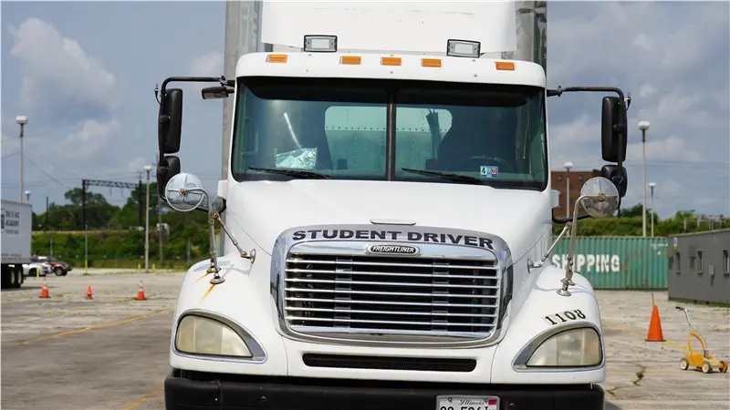 Student driver truck parked in lot