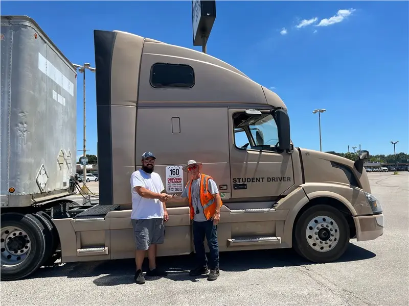 student driver truck handshake
