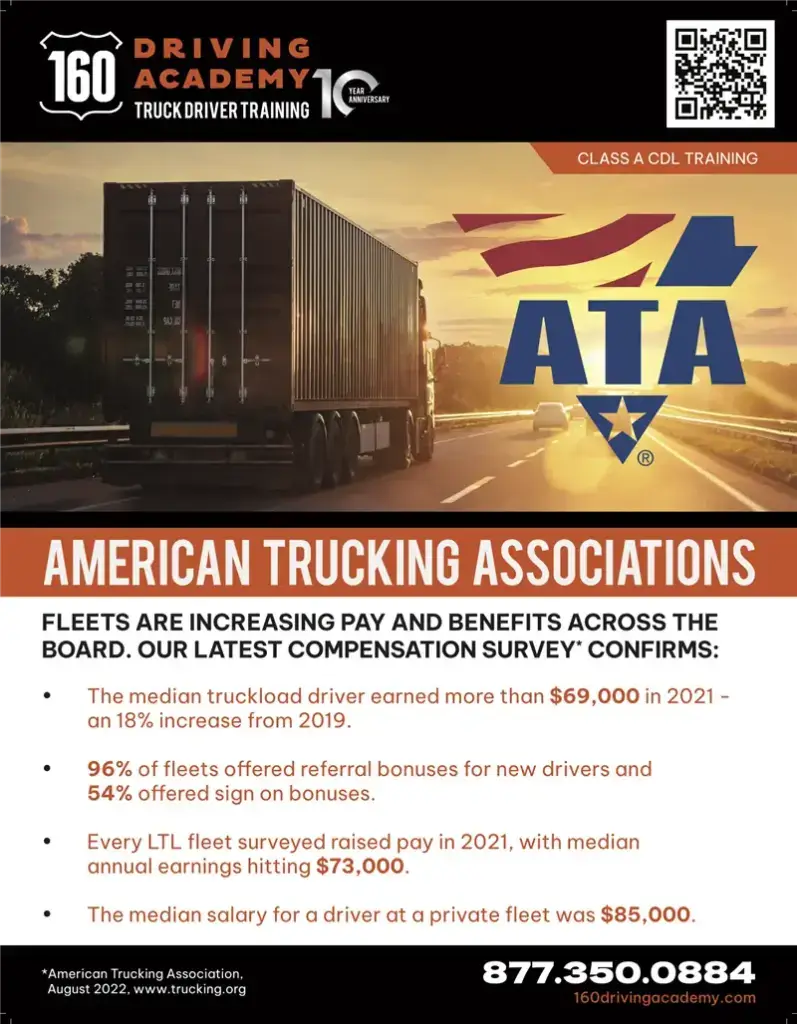 Semi-truck driving on highway at sunset