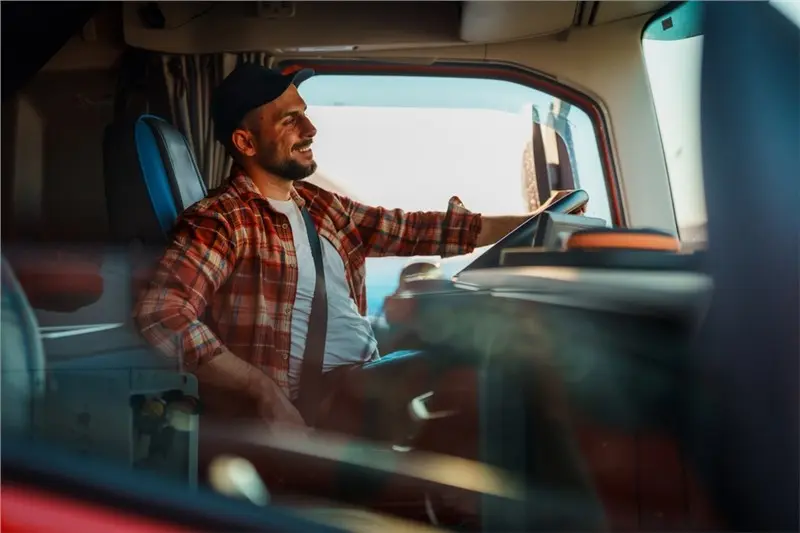 truck driver smiling interior
