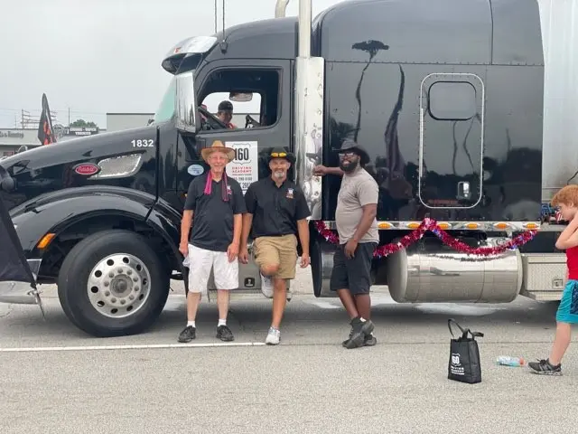 truck drivers with black truck