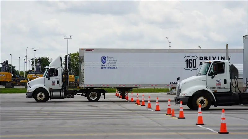 Trucks parked in driving academy training area