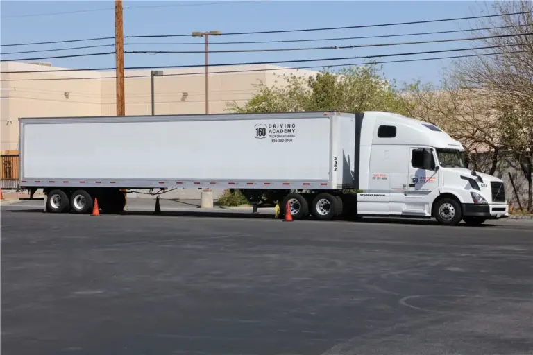 White semi-truck parked during CDL training session